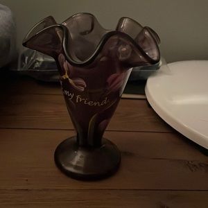 Purple hand painted glass vase with flowers.